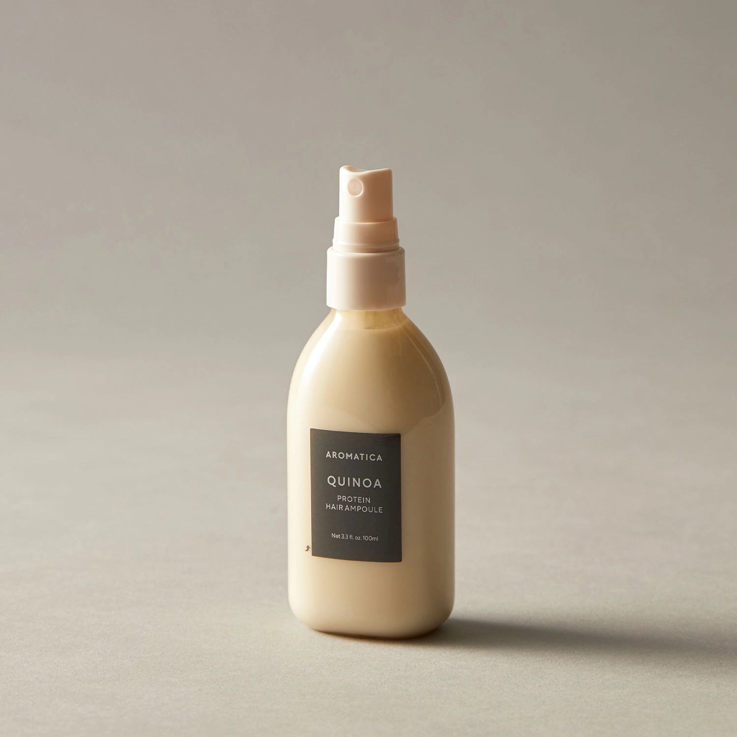 Izsmidzināms serums bojātiem matiem ar peptīdiem Aromatica Quinoa Protein Hair Ampoule